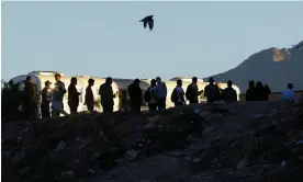  ?? 23 September. Photograph: José Luis González/Reuters ?? Asylum-seeking migrants cross the Rio Bravo river in Ciudad Juarez in El Paso, Texas, on