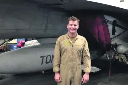  ?? Laura Mackenzie / The National ?? The US naval pilot who spoke to The National, pictured in the hangar of the USS George HW Bush aircraft carrier.