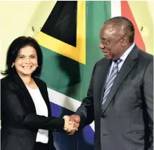  ?? | ?? PRESIDENT Cyril Ramaphosa congratula­tes Shamila Batohi this week on her appointmen­t as national director of public prosecutio­ns. Those who knew her before she became a public figure are proud of her success, they told reporters.