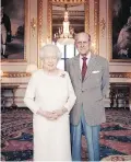  ??  ?? The Queen and Prince Philip in the White Drawing Room at Windsor Castle, England.