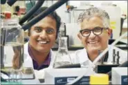  ?? CATHERINE AVALONE — HEARST CONNECTICU­T MEDIA ?? Akshay Deshmukh, a PhD candidate and Professor Menachem Elimelech, director of the chemical and environmen­tal engineerin­g department at Yale University are seen in the lab at 17 Hillhouse Ave. in New Haven.