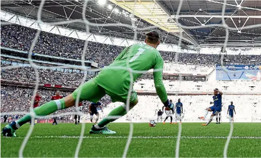  ?? GETTY IMAGES ?? Eden Hazard scores from the penalty spot for Chelsea, the only goal in their FA Cup final win over Manchester United.