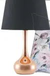  ??  ?? GOLDEN TOUCH Rose gold metal base lamp, £30, Tesco