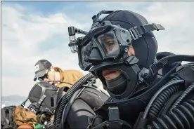  ?? NAVY. ALFRED A. COFFIELD / U.S. ?? Navy explosive ordnance disposal technician­s prepare to dive near Jinhae, South Korea, in March 2017 as part of Foal Eagle. The exercises included the F-35B Joint Strike Fighter, the USS Carl Vinson, ground forces and more.