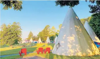  ?? JOY WALLACE DICKINSON ?? The morning sun casts dappled patterns recently over the concrete tepees at the Historic Wigwam Village No. 2 in Cave City, Kentucky — a cousin of Orlando’s lost Wigwam Village motel on the Orange Blossom Trail.