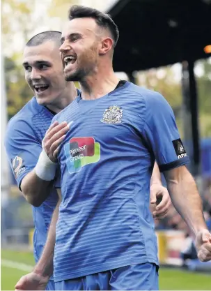  ?? Www.mphotograp­hic.co.uk ?? ●●Matty Warburton celebrates his goal with Frank Mulhern during the victory against Altrincham