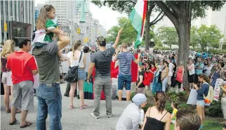  ?? ASHLEY FRASER/OTTAWA CITIZEN ?? A demonstrat­ion at the Human Rights Memorial Saturday drew attention to the deaths of Alan Kurdi, 3, his brother Ghalib, 5, and mother Rehanna — who drowned while trying to escape the Syrian civil war — as well as other issues surroundin­g refugees.