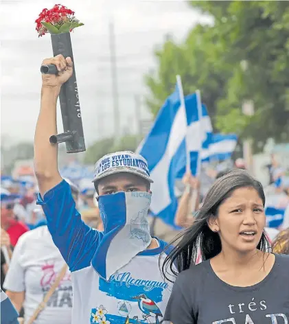  ?? EFE ?? En Managua. Una marcha, el martes, en apoyo a médicos despedidos por atender a opositores heridos.