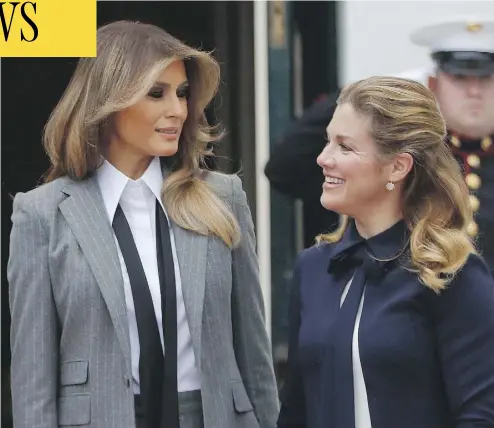  ?? PABLO MARTINEZ MONSIVAIS / THE ASSOCIATED PRESS ?? U.S. first lady Melania Trump welcomes Sophie Gregoire Trudeau to the White House on Wednesday, as their husbands, U.S. President Donald Trump and Prime Minister Justin Trudeau, met to discuss trade.