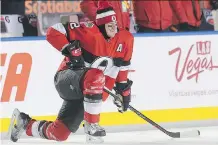  ?? WAYNE CUDDINGTON ?? Dion Phaneuf stretches during warm-up at the Scotiabank NHL 100 Classic outdoor game at Lansdowne Park. The Sens beat the Habs 3-0.