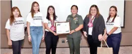  ?? ?? Awarding of Certificat­e of Appreciati­on to keynote speaker Col. Rosa Maria Cristina Rosete-Manuel for sharing her empowering journey and insights by NEVP Aira Pimentel, Pinay Power National Chairperso­n Alyssa Rocamora-Caabay, President Camille Anne Catama of JCI Puerto Princesa Peacock, President Charinna Barro-Quilaneta and VP for Community Cherilyn Saludares of JCI Lakambini Davao.
