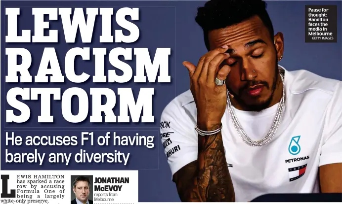  ?? GETTY IMAGES ?? Pause for thought: Hamilton faces the media in Melbourne