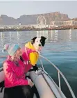  ?? | CAPE OF GOOD HOPE SPCA ?? WARRINGTON’S wife Elmarie, supported him as boat skipper, and their dog Lily as chief motivator and shark spotter.