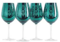  ?? HOMEGOODS ?? Baccarat offers an emerald green wine glass, but these glasses from HomeGoods are considerab­ly less expensive.