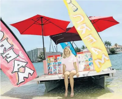  ?? AMY BETH BENNETT/SOUTH FLORIDA SUN SENTINEL ?? The Ice Cream Float sells 24 varieties of prepackage­d ice cream, along with iced coffees, Gatorade and snacks, for boaters and homeowners along the waterways of northern Broward County.