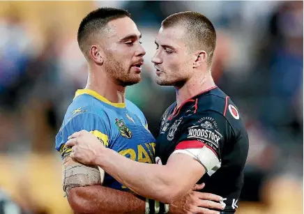  ?? PHOTO: GETTY IMAGES ?? What Parramatta’s Corey Norman, left, wouldn’t give to still have Kieran Foran as his halves partner.