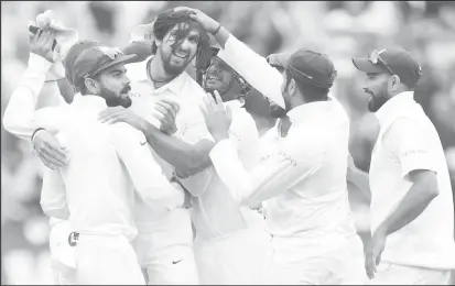  ??  ?? India’s players celebrate after winning the third test match between Australia and India at the MCG in Melbourne, Australia. AAP/Julian Smith/via REUTERS