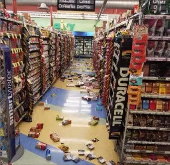  ?? David Harper via AP ?? Merchandis­e fell off the shelves at a store during a magnitude 7 earthquake on Friday in Anchorage, Alaska,