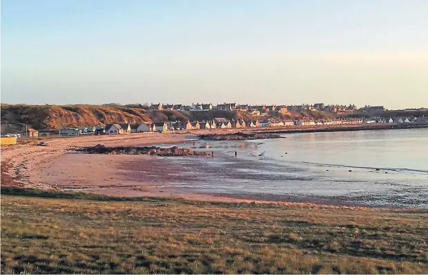  ?? Photograph by reader John Mair, of Buckie ?? The quiet, sunlit beach at charming Portessie in Moray, captured during an evening walk.