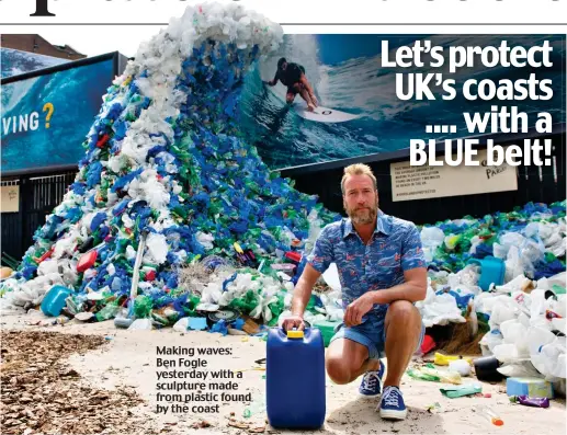  ??  ?? Making waves: Ben Fogle yesterday with a sculpture made from plastic found by the coast