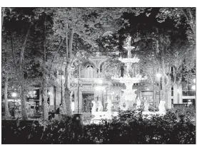  ?? PHOTOS BY MICHELLE LOCKE VIA AP ?? An illuminate­d fountain shines bright at night in a plaza in Montevideo’s Ciudad Vieja, or old city. Walking around the area is a good way to explore the varied architectu­re of Uruguay’s capital.