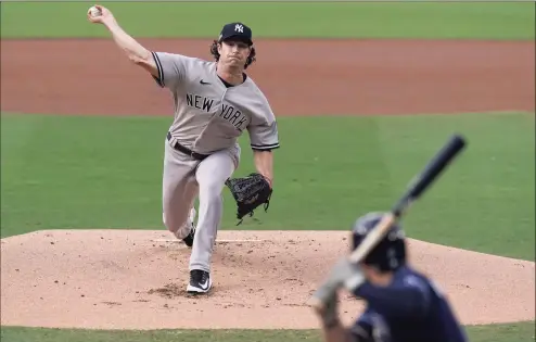  ?? Jae C. Hong / Associated Press ?? New York Yankees starting pitcher Gerrit Cole throws to a Tampa Bay Rays batter during the first inning in Game 5 of the ALDS on Friday.