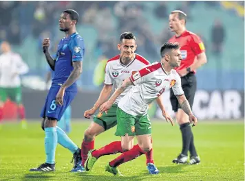  ?? EPA ?? Bulgaria’s Spas Delev, front right, turns to celebrate after scoring his side’s second goal against the Netherland­s.