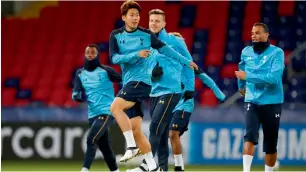  ?? Reuters ?? Tottenham’s Son Heung-min, Kevin Wimmer and Michel Vorm during a training session. —
