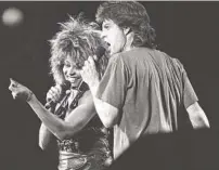  ?? RUSTY KENNEDY AP ?? Turner and Mick Jagger perform during Live Aid in 1985.