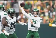  ?? Quinn Harris / Getty Images ?? The Jets’ Zach Wilson passes the football in the first half against the Green Bay Packers during a preseason game at Lambeau Field in Green Bay, Wis., in August.