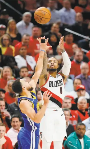  ?? Jonathan Ferrey / Getty Images 2019 ?? Portland’s Damian Lillard takes a jumper over Stephen Curry in the 2019 Western Conference finals. Lillard and Curry are noted longdistan­ce shooters.