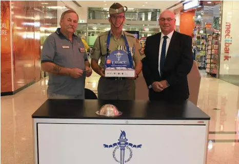  ?? PHOTO: CONTRIBUTE­D ?? WITH HEART: Supporting a good cause are Legatee Mike Dwight, Warrant Officer Class 2 Brett Mesken and Kevin Gates, Heritage Bank Darling Downs Senior Regional Sales and Service Manager.