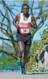  ??  ?? Above left Thomas Omwenga on his way to winning the 2013 BMO Vancouver Marathon