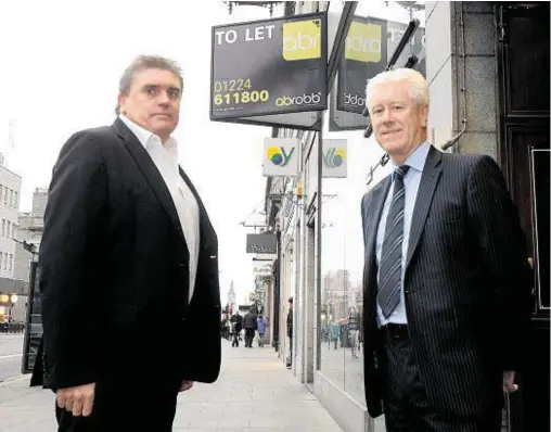  ??  ?? MISSION: Aberdeen Inspired director Allan Henderson and Alex Robb of AB Robb, look to rid Union Street of all estate agent V-boards