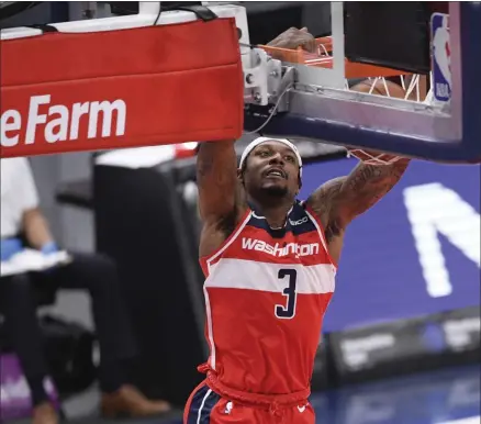  ?? TWITTER.COM/ONEIDADISP­ATCH NICK WASS ?? Washington Wizards guard Bradley Beal (3) goes to the basket during the first half of an NBA basketball game against the Los Angeles Clippers, Thursday, March 4, 2021, in Washington.