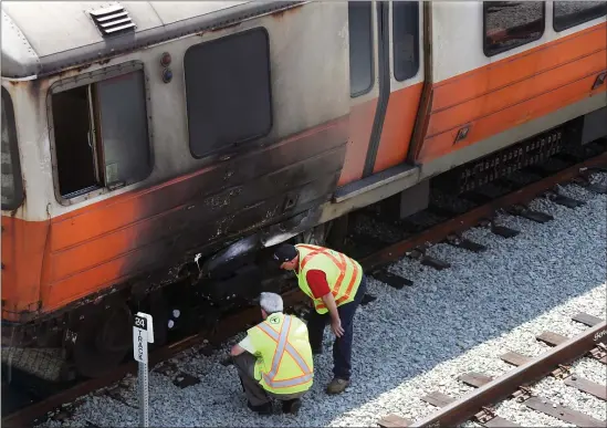  ?? NANCY LANE — BOSTON HERALD ?? The mayor gave the MBTA a 4.8 out of train-wreck 5 after one mishap after another.