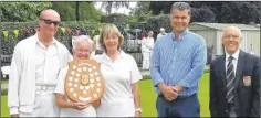  ??  ?? Tenterden Mixed Triples winners Peasmarsh. Sonny Moore, Mo Crossley and skip Steph Stewart with sponsor Morris Hankinson of Hopes Grove Nurseries and Tenterden captain Ray Walker