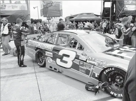  ?? MARIO PARKER/BLOOMBERG NEWS ?? Rookie driver Austin Dillon’s modified Chevrolet SS (at NASCAR’s Quicken Loans 400 in Brooklyn, Mich.) runs on E-15, fuel that is 15 percent ethanol.