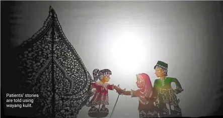  ?? ?? Patients’ stories are told using wayang kulit.