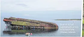  ??  ?? Dive in: A half submerged wreck in Scapa Flow, Orkney Islands