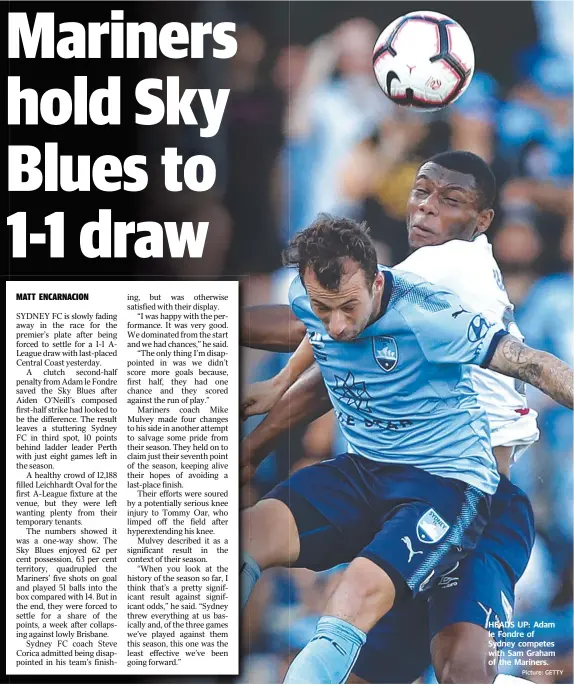  ?? Picture: GETTY ?? HEADS UP: Adam le Fondre of Sydney competes with Sam Graham of the Mariners.