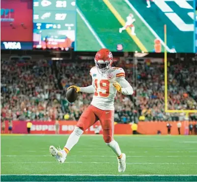  ?? ABBIE PARR/AP ?? Kadarius Toney scores a 5-yard receiving touchdown in the fourth quarter for one of his two big plays in the Chiefs’ win Sunday.