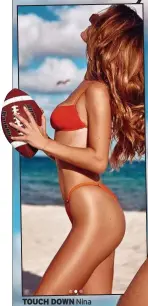  ?? ?? TOUCH DOWN Nina Agdal is a grid iron fan