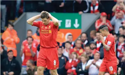  ?? ?? Steven Gerrard shows his dismay after his slip derailed Liverpool’s title bid in 2014. Photograph: Peter Byrne/PA