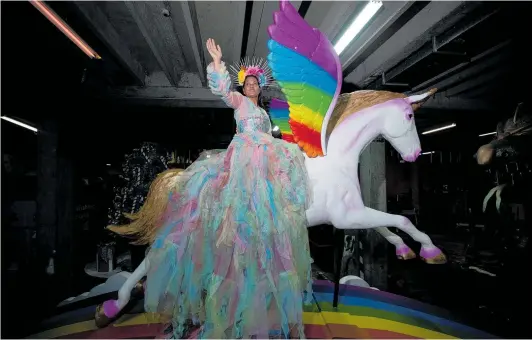  ?? Photo / Dean Purcell ?? Janice Kumar-Ward gets acquainted with the rainbow float she will be on during the 2022 Auckland Santa Parade this weekend.