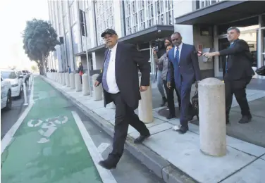  ?? Jeff Chiu / Associated Press ?? ThenPublic Works chief Mohammed Nuru exits federal court in February ahead of attorney Ismail Ramsey.