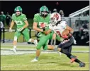  ?? Adam Dortch ?? Sonoravill­e’s JoJo McDaniels looks for space against Murray County on Friday night.