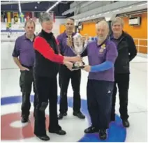  ??  ?? John Ferguson, Gavin Reid, Gerald MacIntyre and skipper David Mee are presented with the cup by Catriona O’Keefe of Glenorchy.