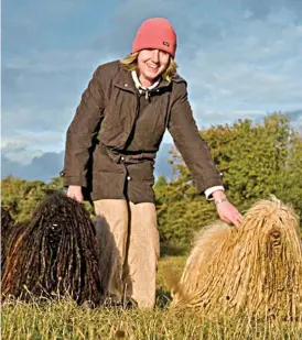  ??  ?? Tweet anger: Corinne Munford with Puli pets Spike and Buster