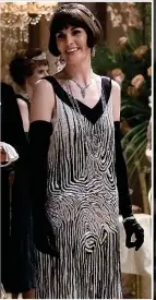 ?? ?? ABBEY HABIT: Michelle Dockery in a flapper dress as Lady Mary in Downton